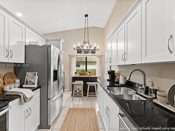 3rd image of 4148 Palm Forest Dr N