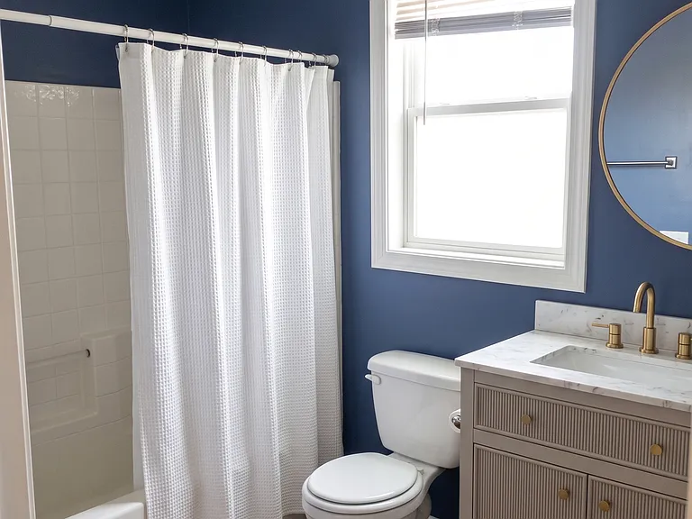 Downstairs bath (new flooring and vanity)