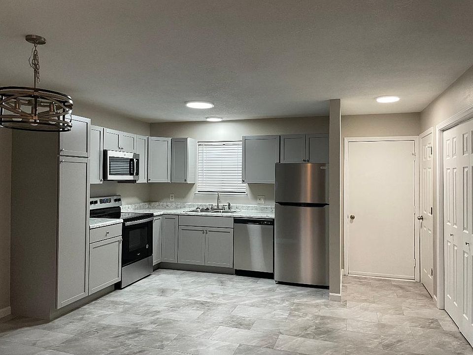 spacious kitchen; stackable washer and dryer in closet to right of front door;