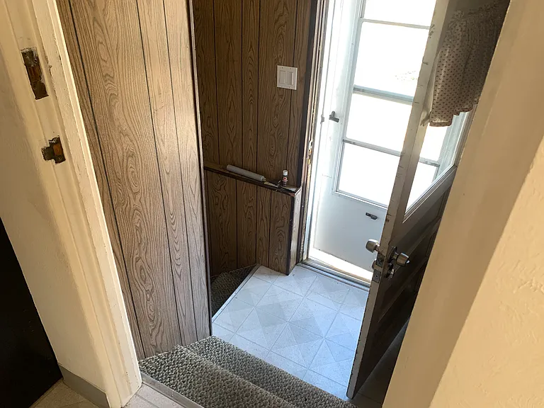 Side entry. Can be used for separate basement access or easy entrance to main kitchen.