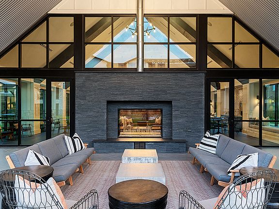 Outdoor Entertainment Lounge with Fireplace and TVs