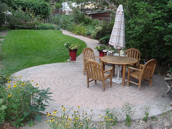 Huge back yard with stamped concrete patio
