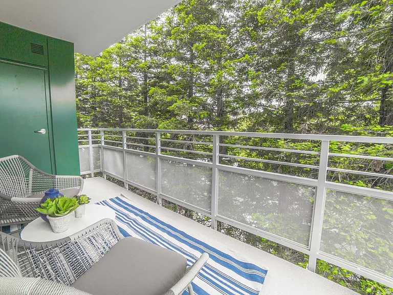 Enjoy a *private balcony experience with green views at the Arroyo Residences