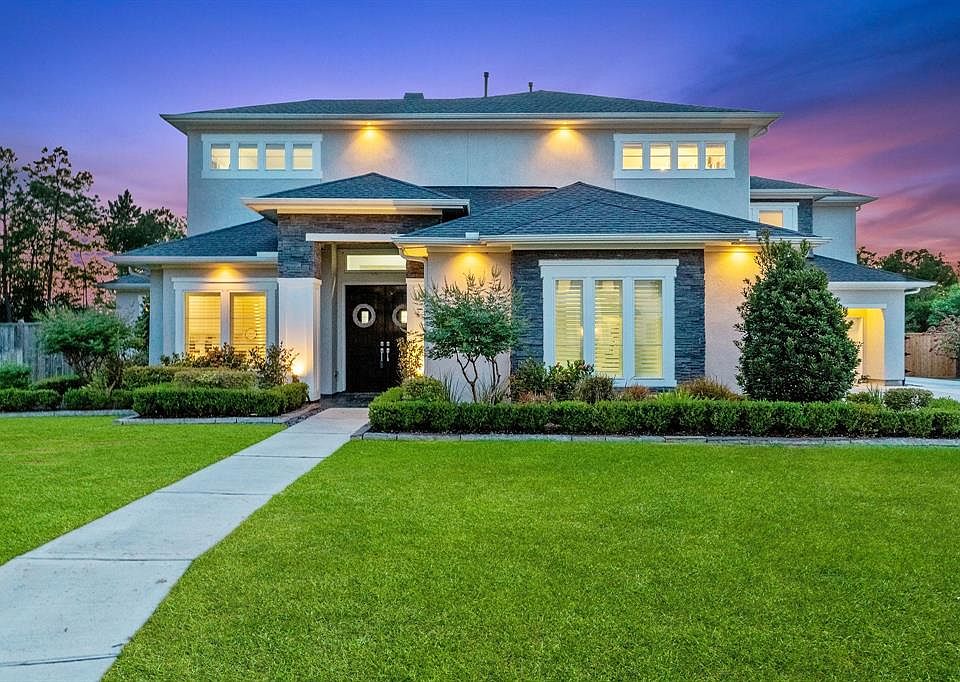 One-of-a-kind modern exterior with stacked stone accents.
