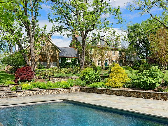 Pool area below the house