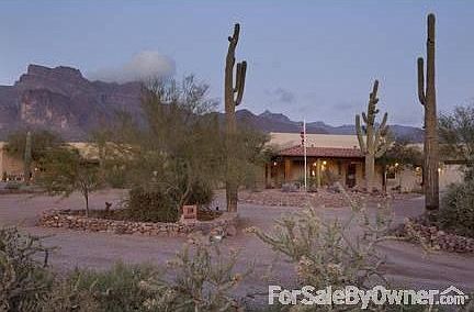 Front Elevation
						:
						Road and drive leading up to the home.