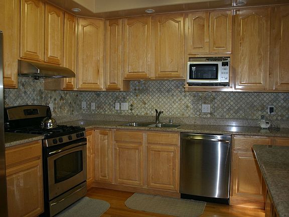 Gourmet kitchen with GE Profile appliances
