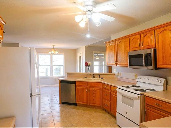 Large eat-in kitchen. Stove, refrigerator, dishwasher, and microwave included in rental.