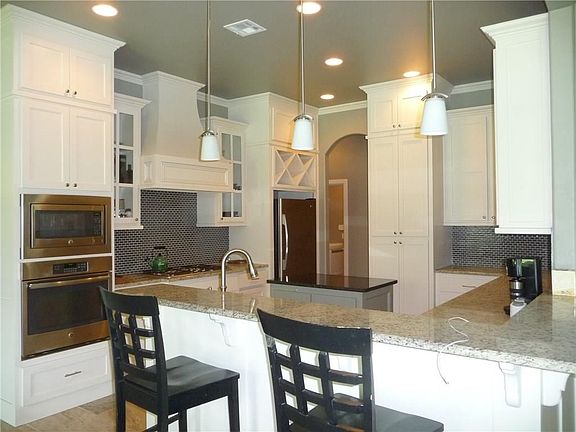 ANOTHER VIEW OF THE KITCHEN