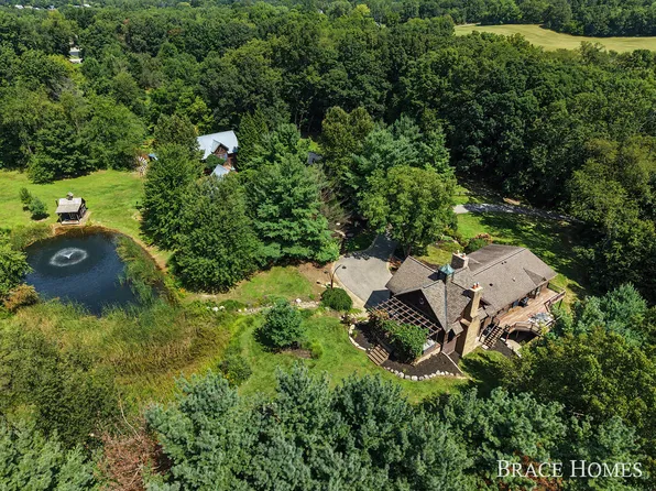 5501 Canyon River Dr NE, Ada, MI 49301