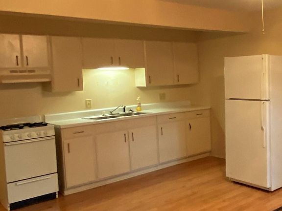 Fresh, clean, bright kitchen with plenty of storage space and lovely large dining area!