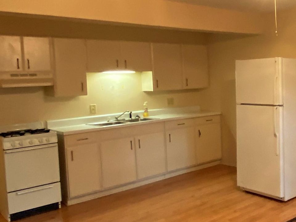 Fresh, clean, bright kitchen with plenty of storage space and lovely large dining area!
