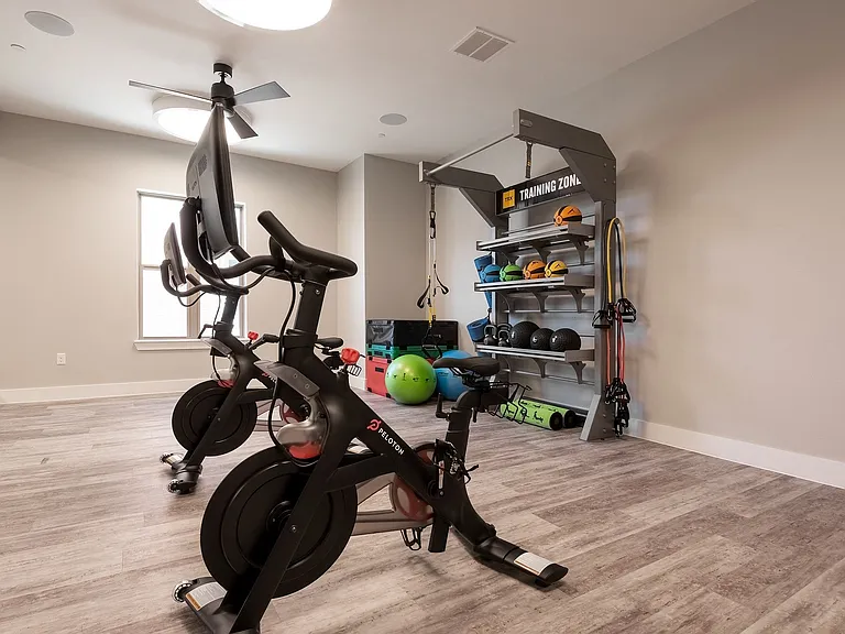Private yoga studio and Peloton bikes.