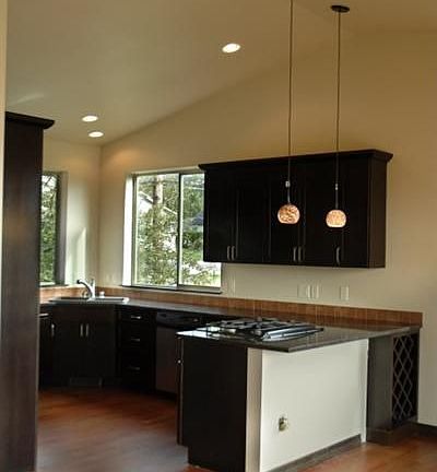 Large spacious kitchen with downdraft oven and smartstop drawers.