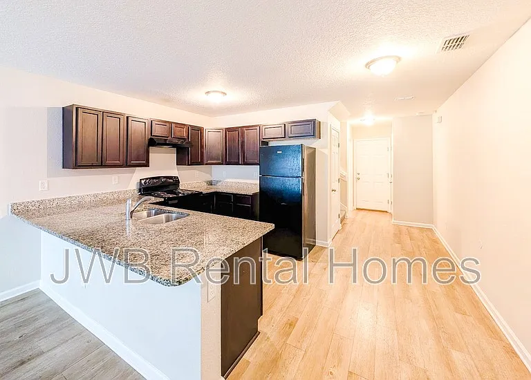 8460 McGirts Village Ln — Photo 2