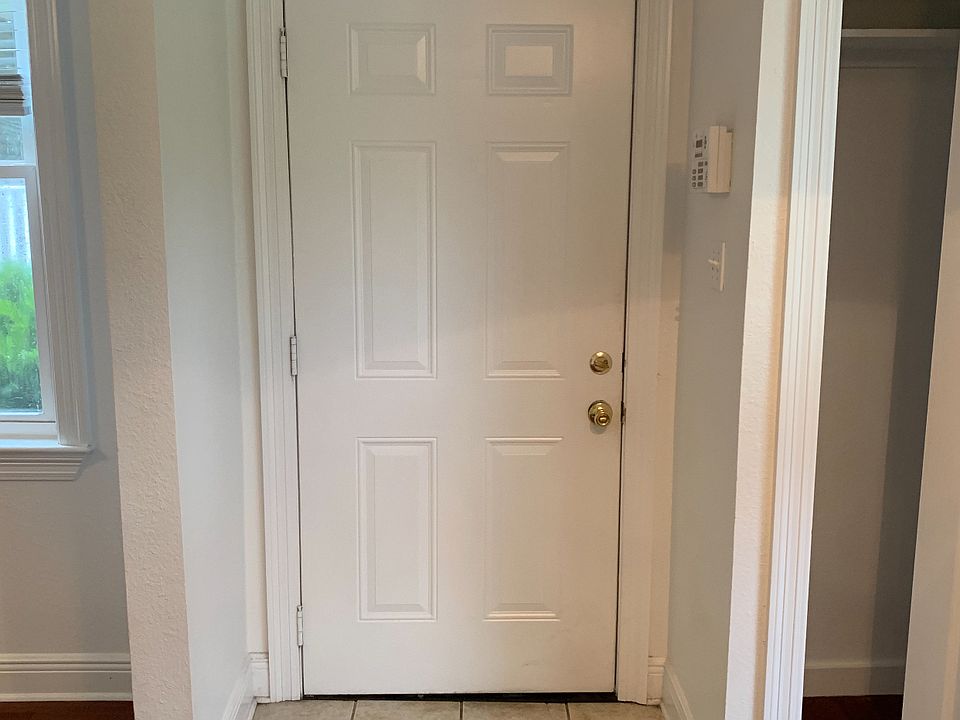Front Door with entry closet on the right.