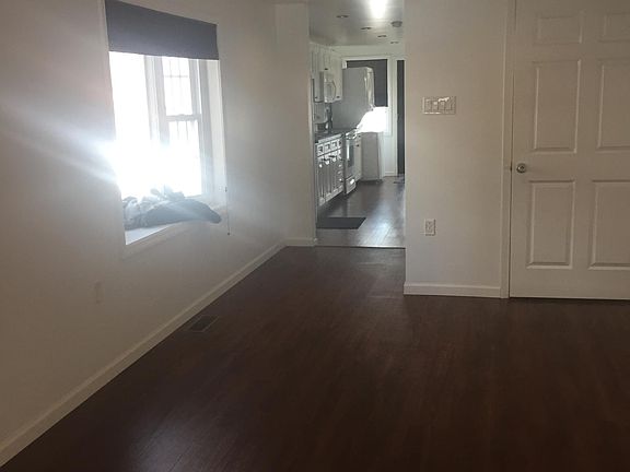 Living room looking into kitchen