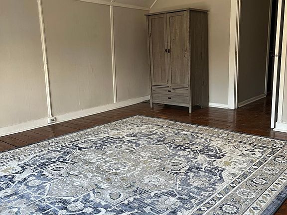 Living Room. There are windows throughout the apartment that provide great natural light.
