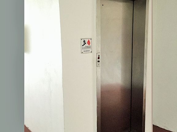Very near the elevator