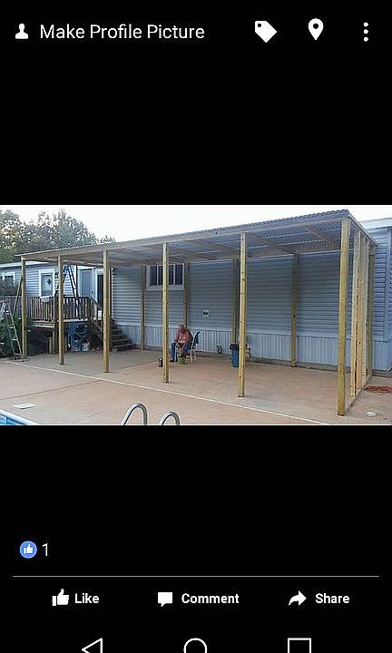 out door living area sits on5acresofwoodedproperty