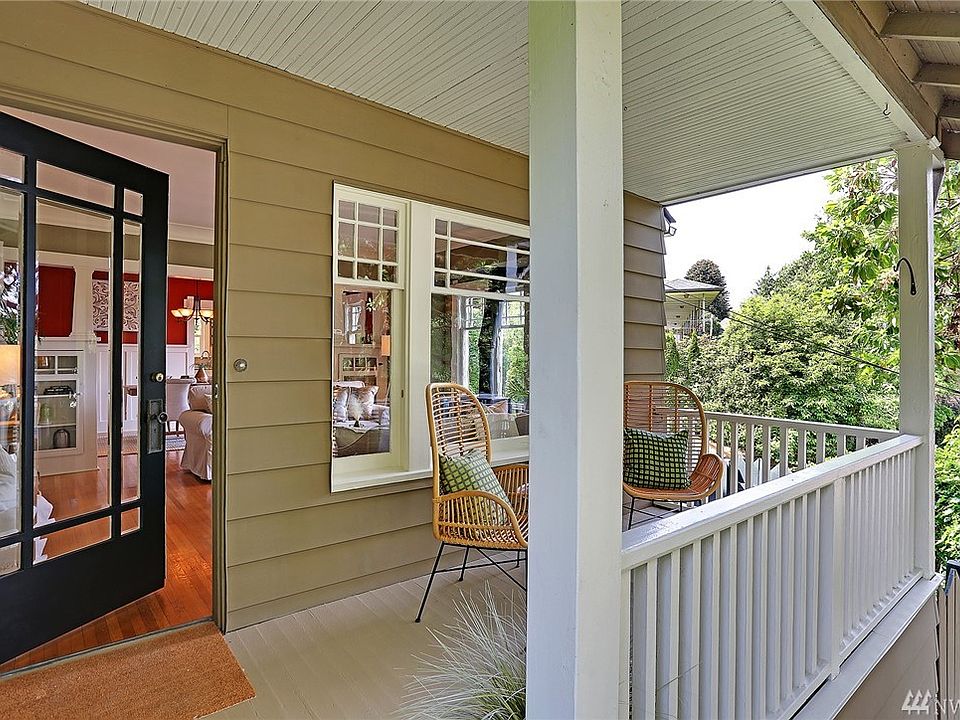 1916 Craftsman style home, lovingly remodeled to retain it's original charm . Rocking chair front porch offers territorial views