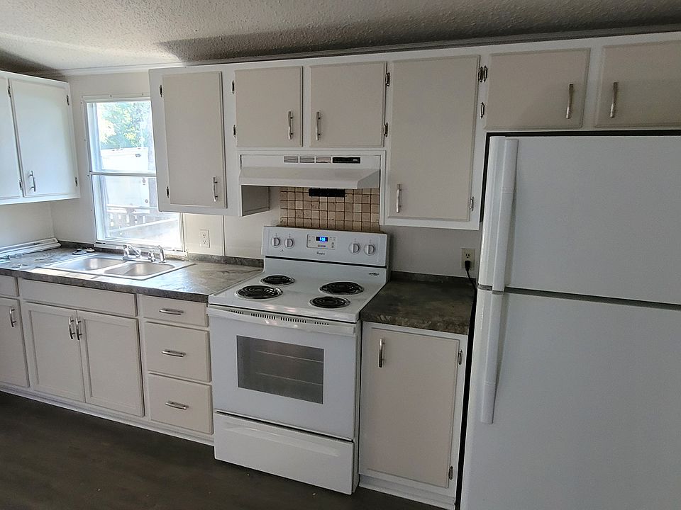 Kitchen, also has built in buffet on other side.