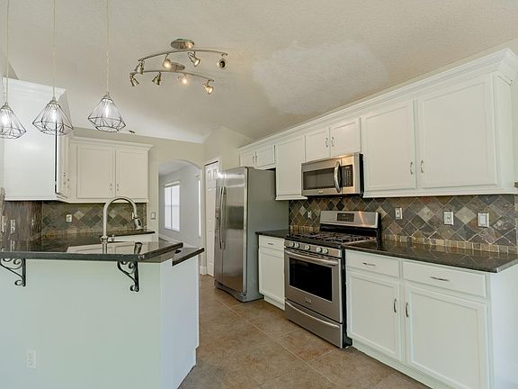 4th image of 558 Carrigan Woods Trl
