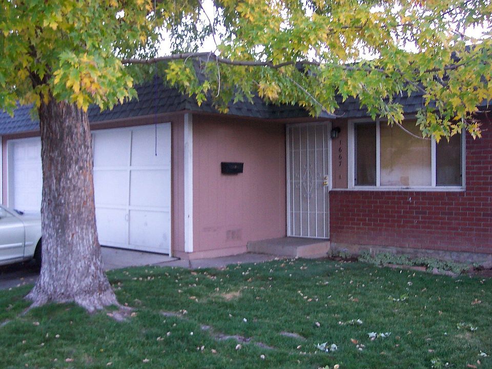 Front / Awaiting new siding from Association
