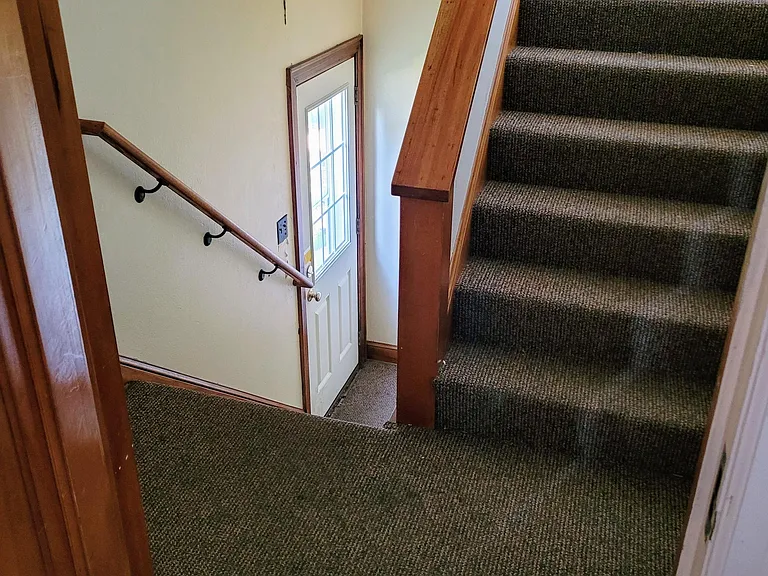 Shared hallway to garage and laundry