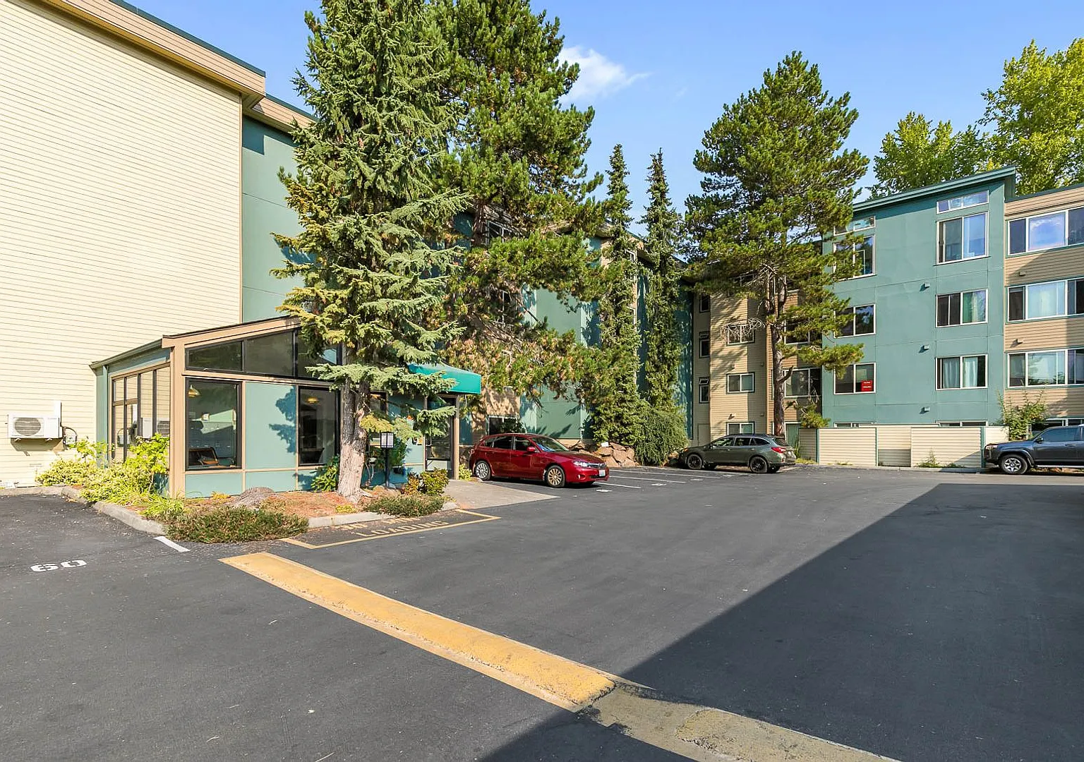 Spacious 2BR Ground-Floor Condo with Oversized Private Deck — Photo 1