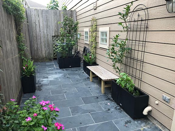 Slate tile yard for entertaining friends or enjoying the sunshine