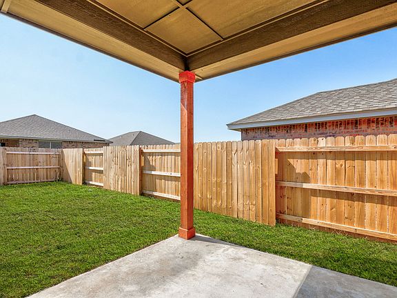 This home comes with a covered back patio perfect for enjoying the outdoors.
