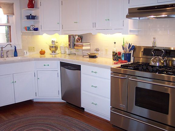 VERY spacious kitchen with custom cabinets, Douglas Fir wood flooring. 