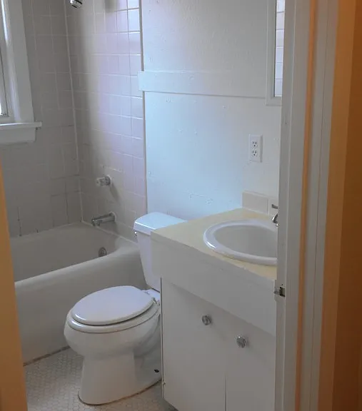 Full bathroom with original restored tub