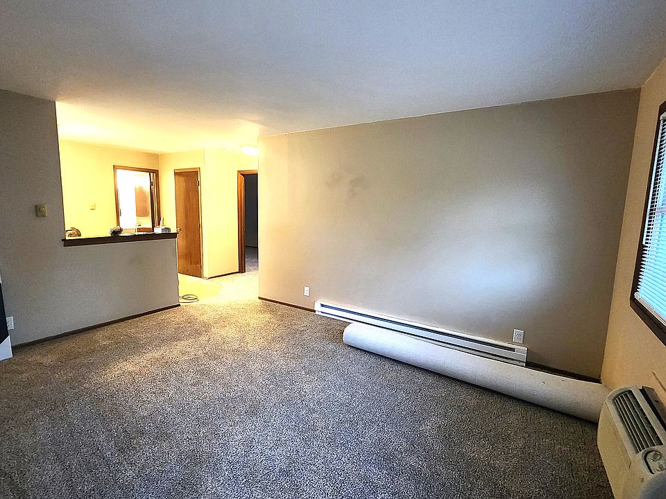 New Carpet in Living Room. Total sq. footage of apartment is 850