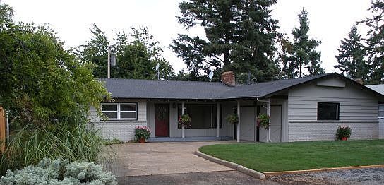 Driveway curves into 2 car garage