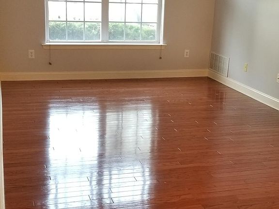 Livingroom with window to parking lot