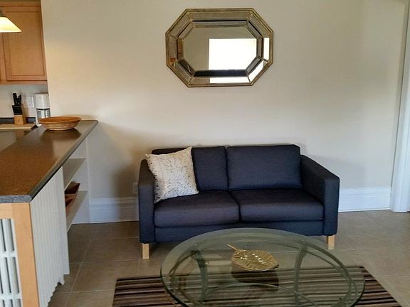 comfortable couch with plenty of bookshelf space