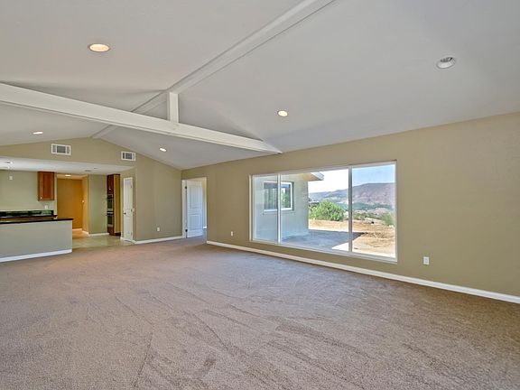 Living room of main house. Kitchen in background.