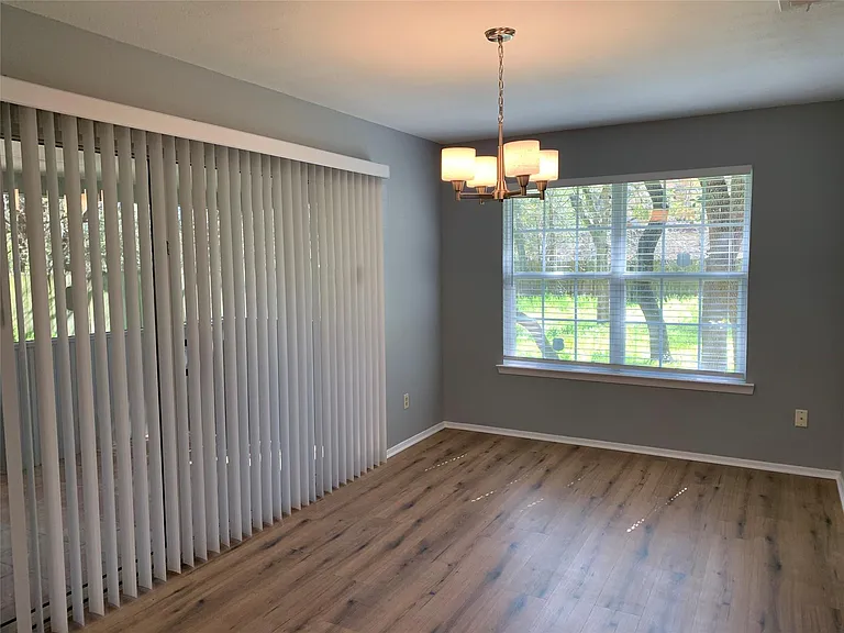 10015 NW Woodland Village Dr — Photo 6
