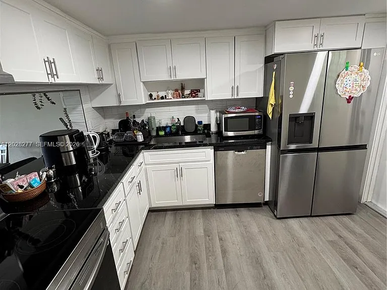 330 SE 2nd St #303H — Photo 6