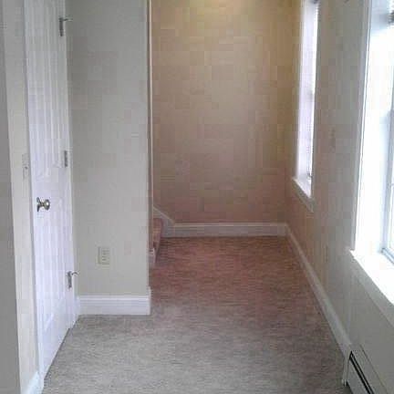 Looking to entry stairs from living room - photo from mirror