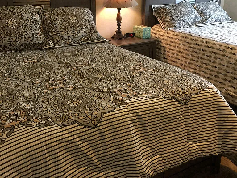Two full size beds in upstairs bedroom