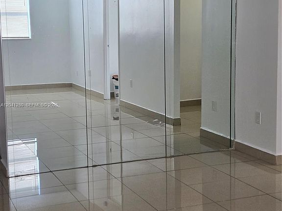3rd image of 4675 W 18th Ct APT 606