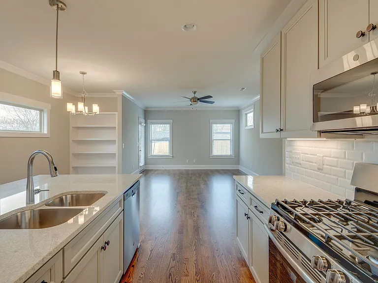 Large downstairs living room with built ins