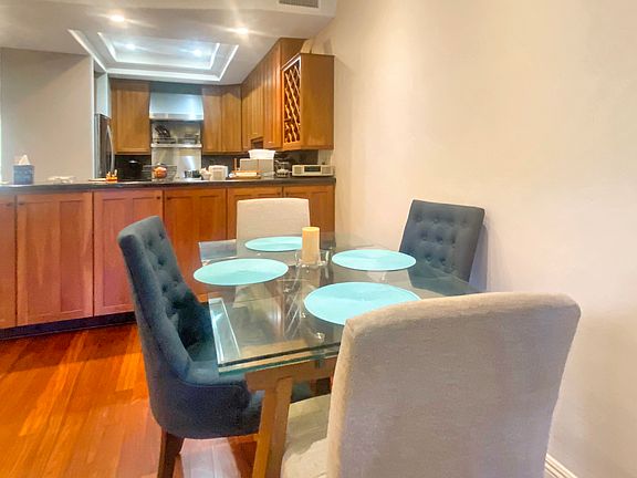 Dining area off living room with open kitchen creates an easy, comfortable great room feeling.