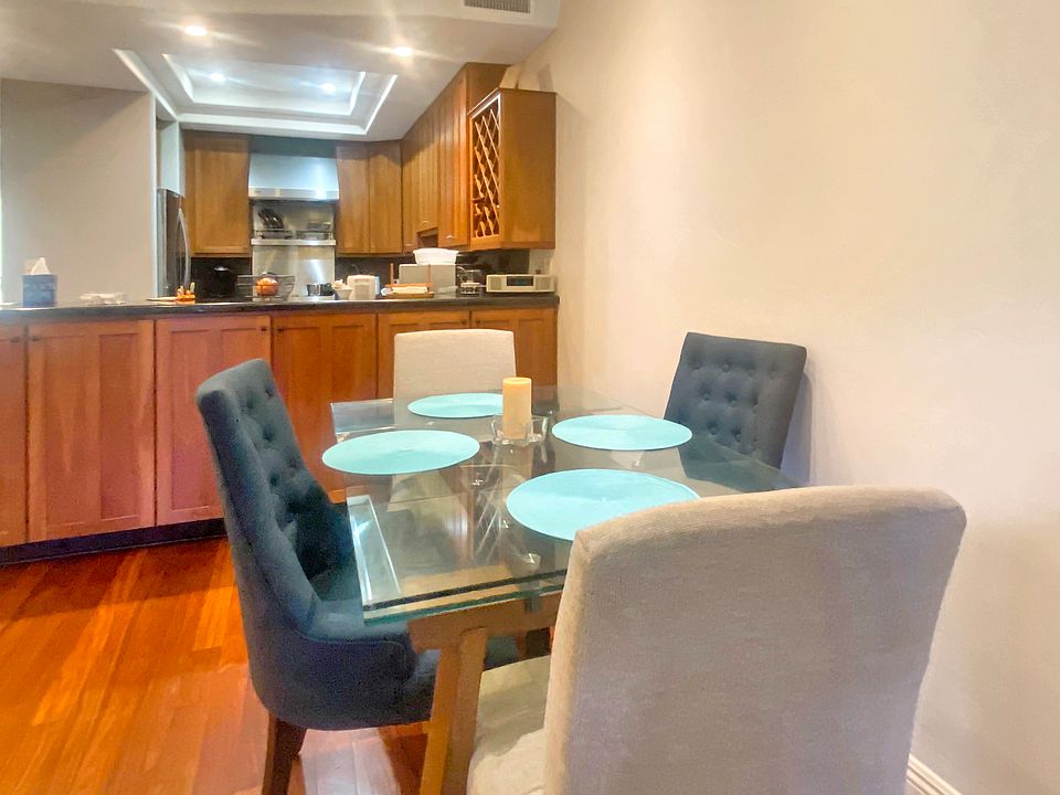 Dining area off living room with open kitchen creates an easy, comfortable great room feeling.