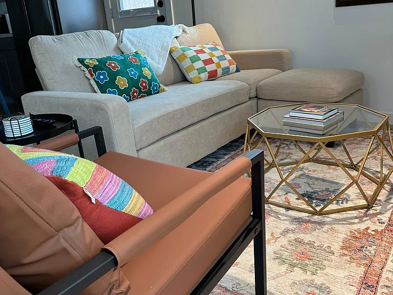 New sofa and chairs, rugs, throw blankets, towels, tables and more. All trendy and fun.
