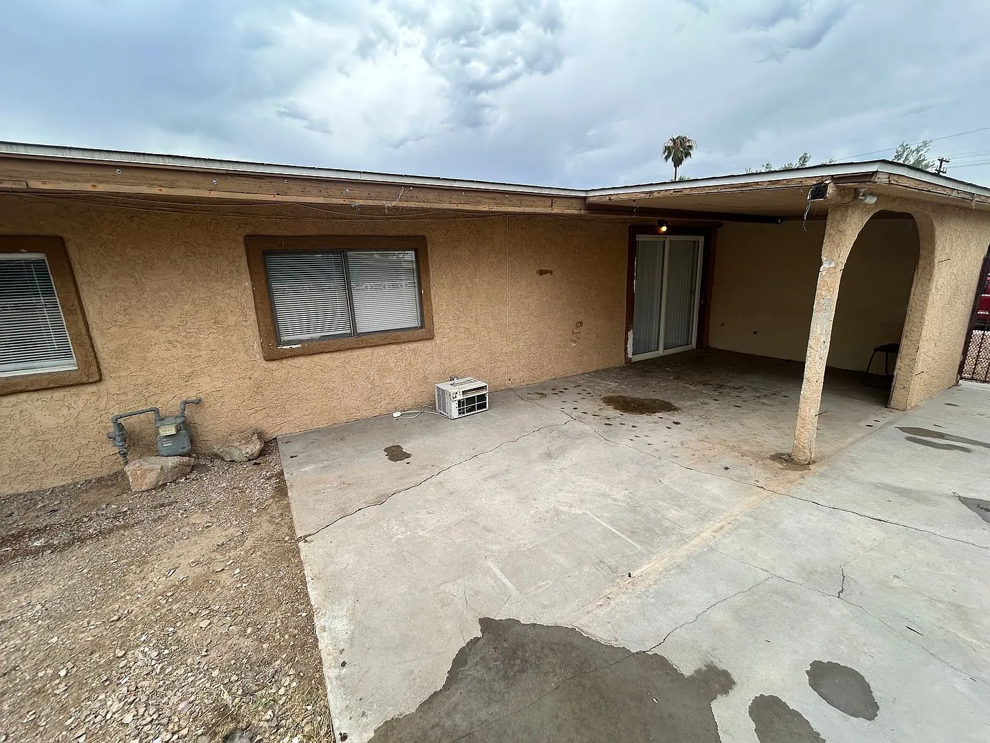 Single story home with large backyard and huge carport with plenty of storage. — Photo 4