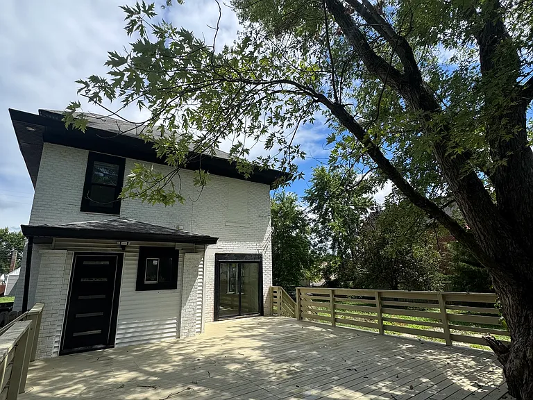 Huge, tree-shaded backyard deck!